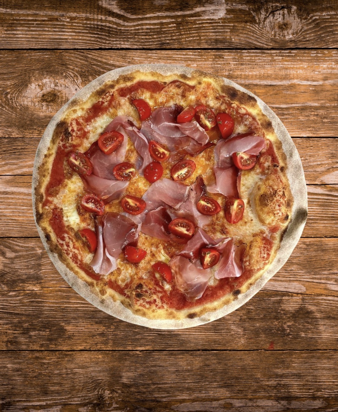 Pizza con prosciutto crudo